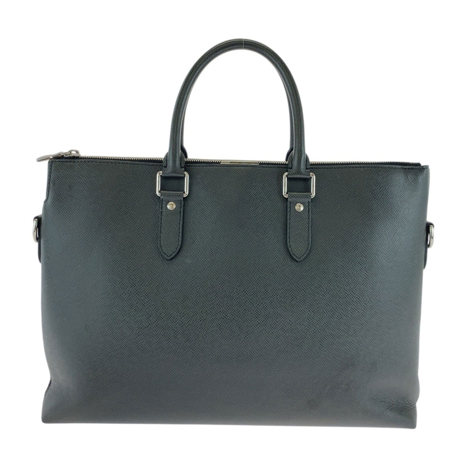 Louis Vuitton Anton Black Leather Bag 29cm x 38cm x 6.5cm: Louis Vuitton Anton Black Leather Bag 29cm x 38cm x 6.5cm The Louis Vuitton Anton is a black leather bag designed for unisex use. It features a spacious interior and a sleek silhouette. The item is in