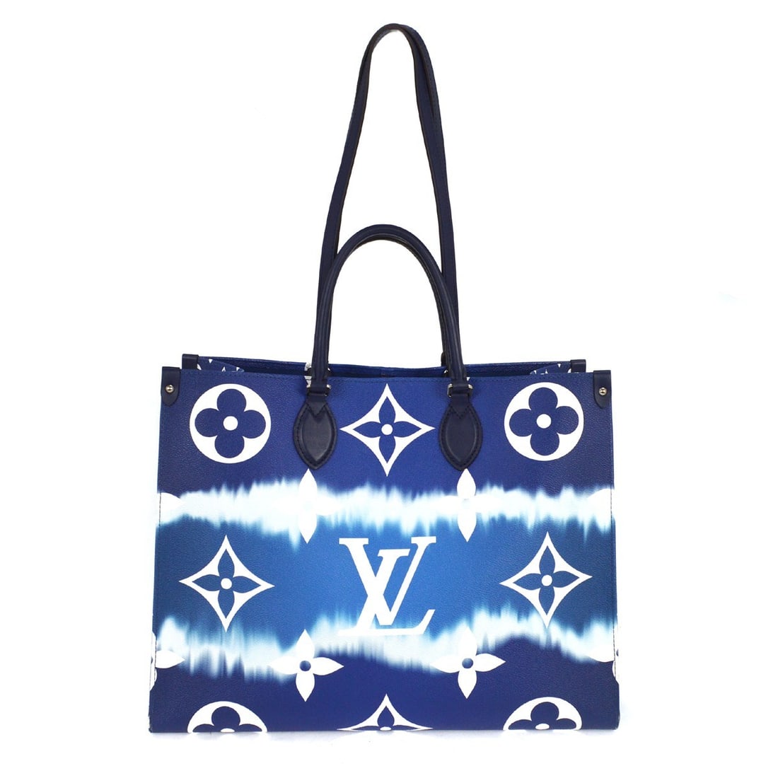 Blue OnTheGo GM 2way tote in monogram canvas by Louis Vuitton: Blue OnTheGo GM 2way tote in monogram canvas by Louis Vuitton This Louis Vuitton OnTheGo GM tote bag features the iconic Monogram pattern in blue on leather monogram canvas. It offers a spacious large