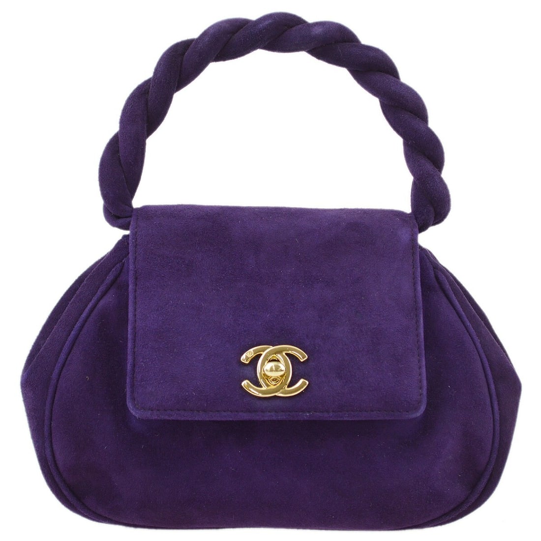 Chanel Purple Suede Top Handle Handbag with Quilted Accents: Chanel Purple Suede Top Handle Handbag with Quilted Accents This elegant Chanel Purple Suede Handbag is perfect for casual occasions, combining style with functionality. The exterior features a rich p