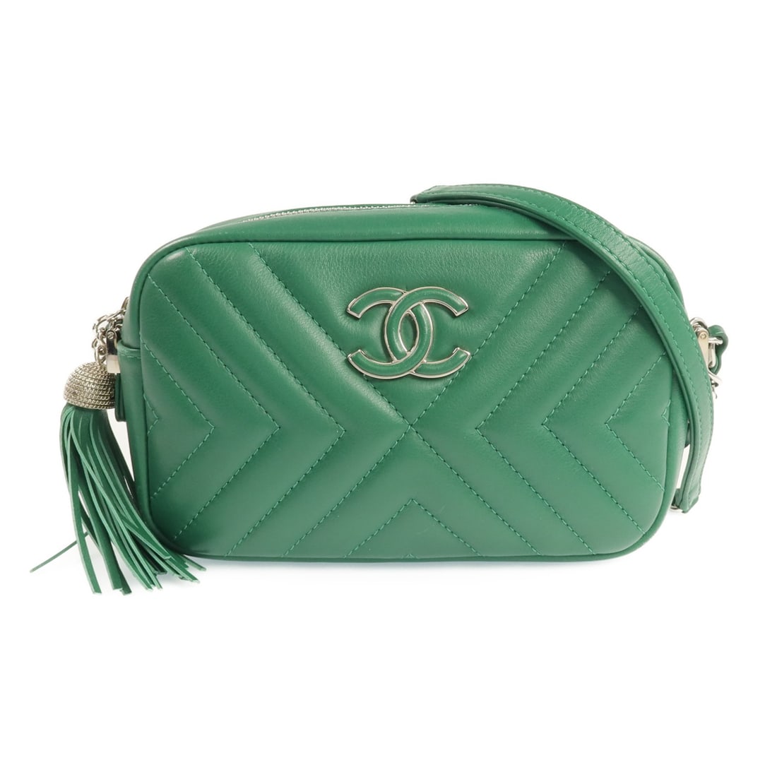 Green Lambskin Camera Shoulder Bag by CHANEL with Silver Tone CC Logo: Green Lambskin Camera Shoulder Bag by CHANEL with Silver Tone CC Logo This Chanel CC camera bag is crafted from green lambskin leather and features a shoulder strap design. The bag is in very good con
