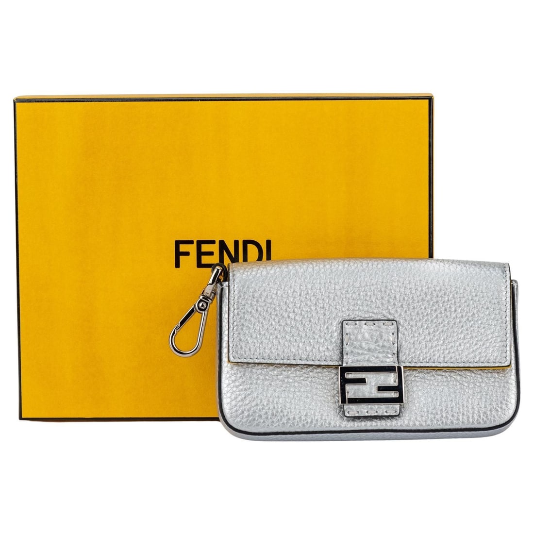 Fendi Micro Baguette Silver Leather with Yellow Interior: Fendi Micro Baguette Silver Leather with Yellow Interior This Fendi Micro Baguette is a stunning accessory crafted from silver leather with a vibrant yellow interior. It features sleek palladium hardw