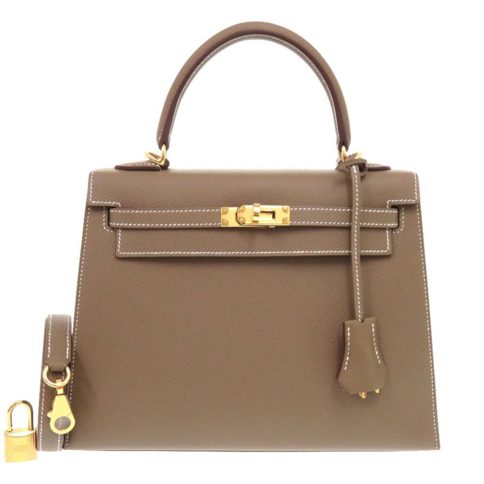 Grey Leather Kelly 25 Bag by Hermes France 18cm x 25cm x 9.5cm: Grey Leather Kelly 25 Bag by Hermes France 18cm x 25cm x 9.5cm This Hermes Kelly 25 handbag features a sophisticated grey leather exterior and is designed for women. The bag is crafted in France and o