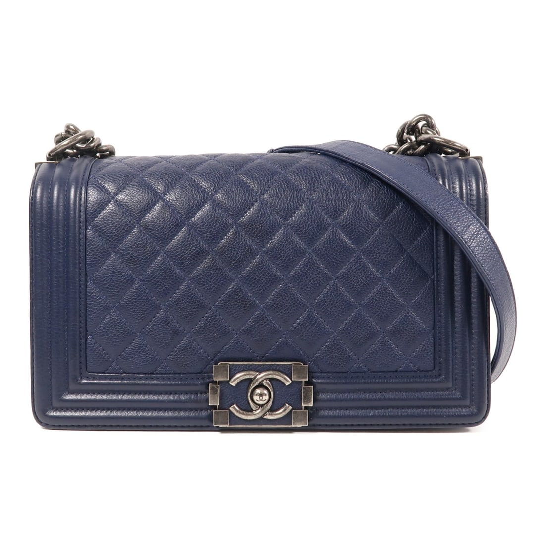 CHANEL Boy 25 Navy Calfskin Leather Shoulder Bag with Chain: CHANEL Boy 25 Navy Calfskin Leather Shoulder Bag with Chain Introducing the CHANEL Boy 25 Chain Shoulder Bag, a stunning accessory crafted from luxurious calfskin leather in a sophisticated navy hue.