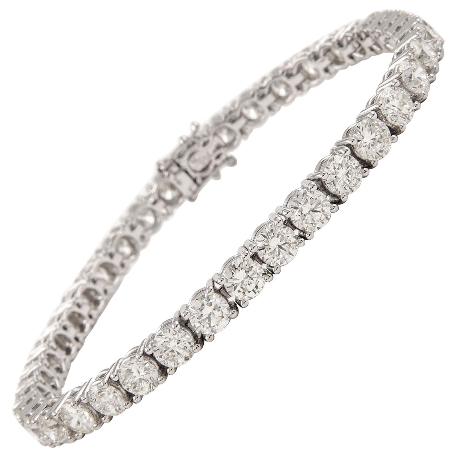 10.77ct Diamond Tennis Bracelet 18k White Gold: 10.77ct Diamond Tennis Bracelet 18k White Gold This exquisite tennis bracelet showcases 38 round brilliant diamonds totaling 10.77 carats, set in luxurious 18k white gold. The diamonds are approximate