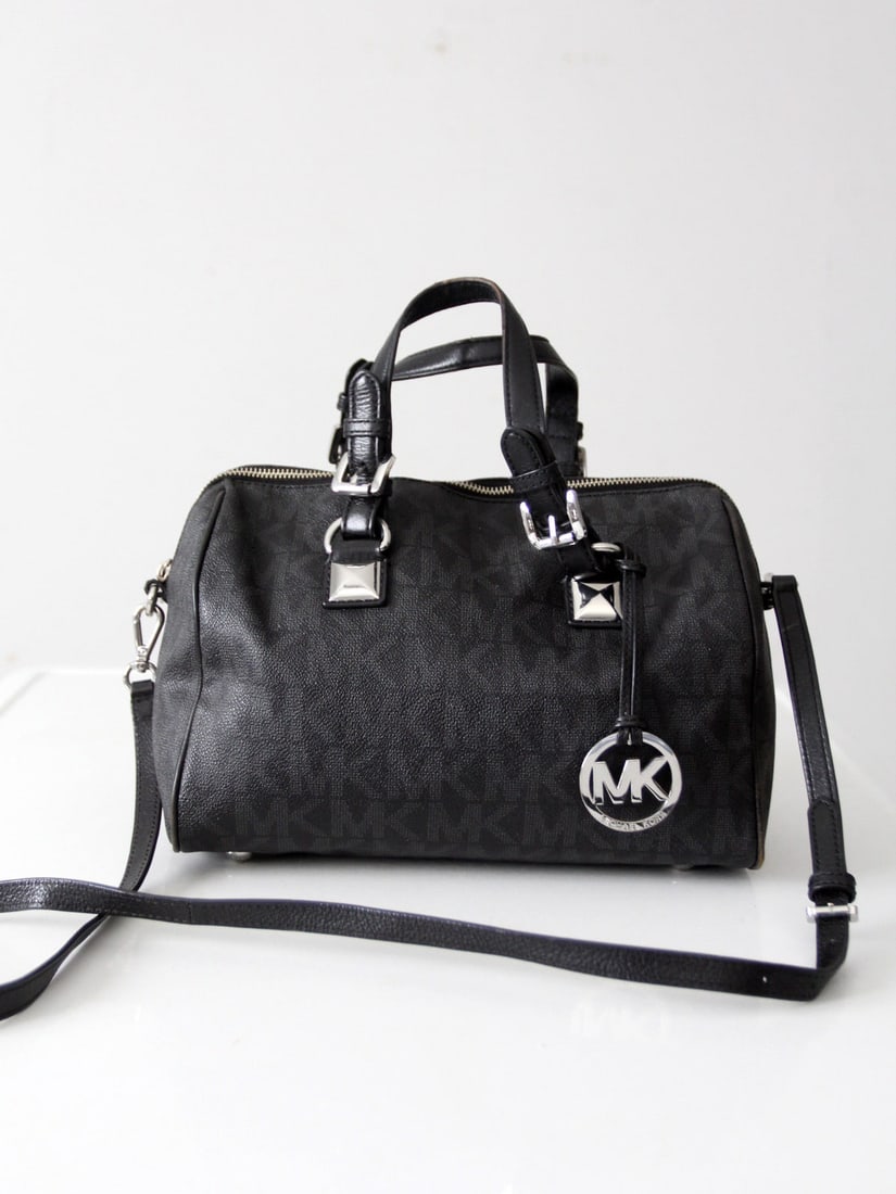 Michael Kors Grayson Monogram Satchel Black with Silver Hardware: Michael Kors Grayson Monogram Satchel Black with Silver Hardware Elevate your accessory collection with the Michael Kors Grayson Monogram Satchel Bag. This stylish medium satchel features a chic black