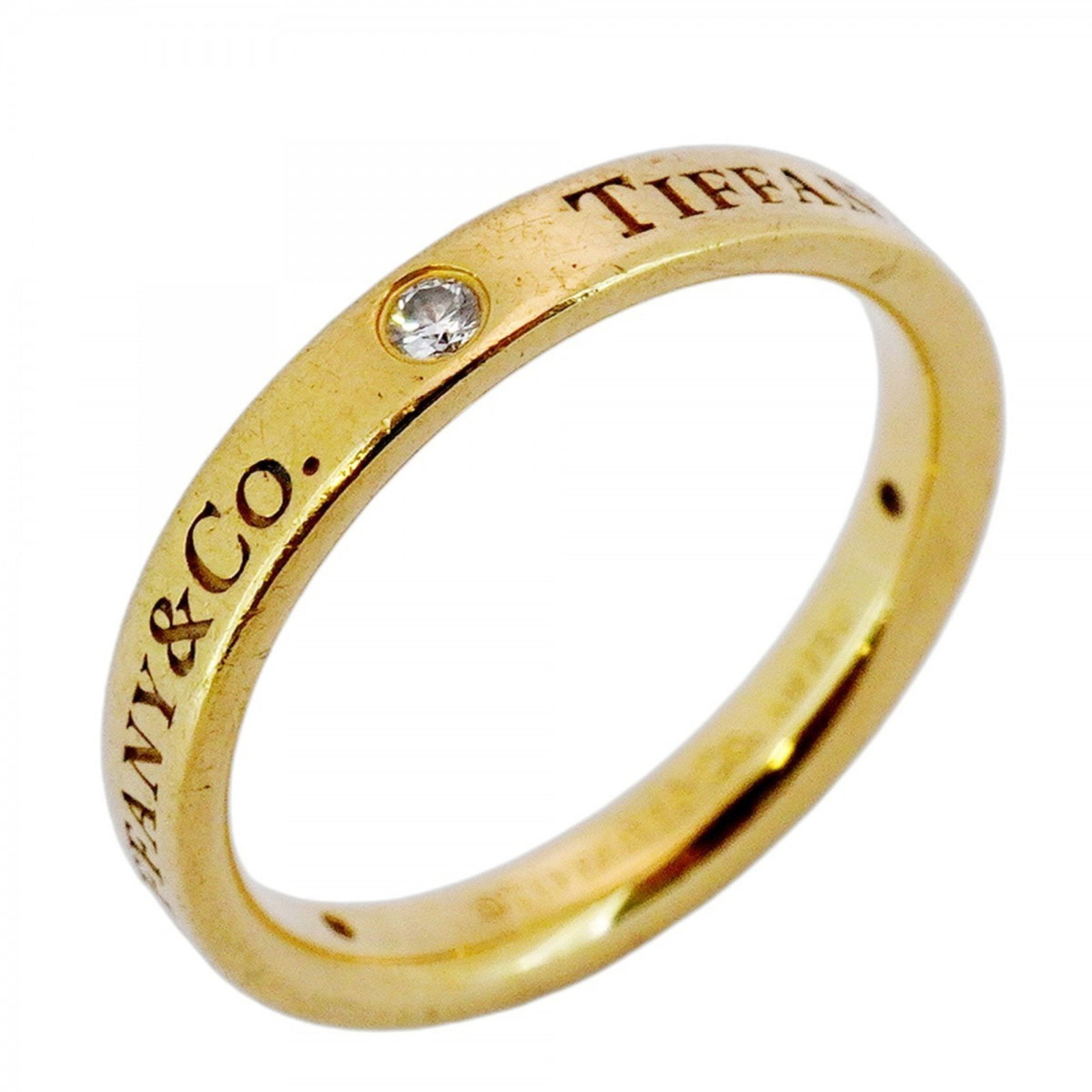 Yellow Gold Flat Band Ring by Tiffany & Co for Women: Yellow Gold Flat Band Ring by Tiffany & Co for Women This Tiffany & Co. flat band ring is crafted from yellow gold and features a sleek, minimalist design. Designed for women, it is size 6 and origina