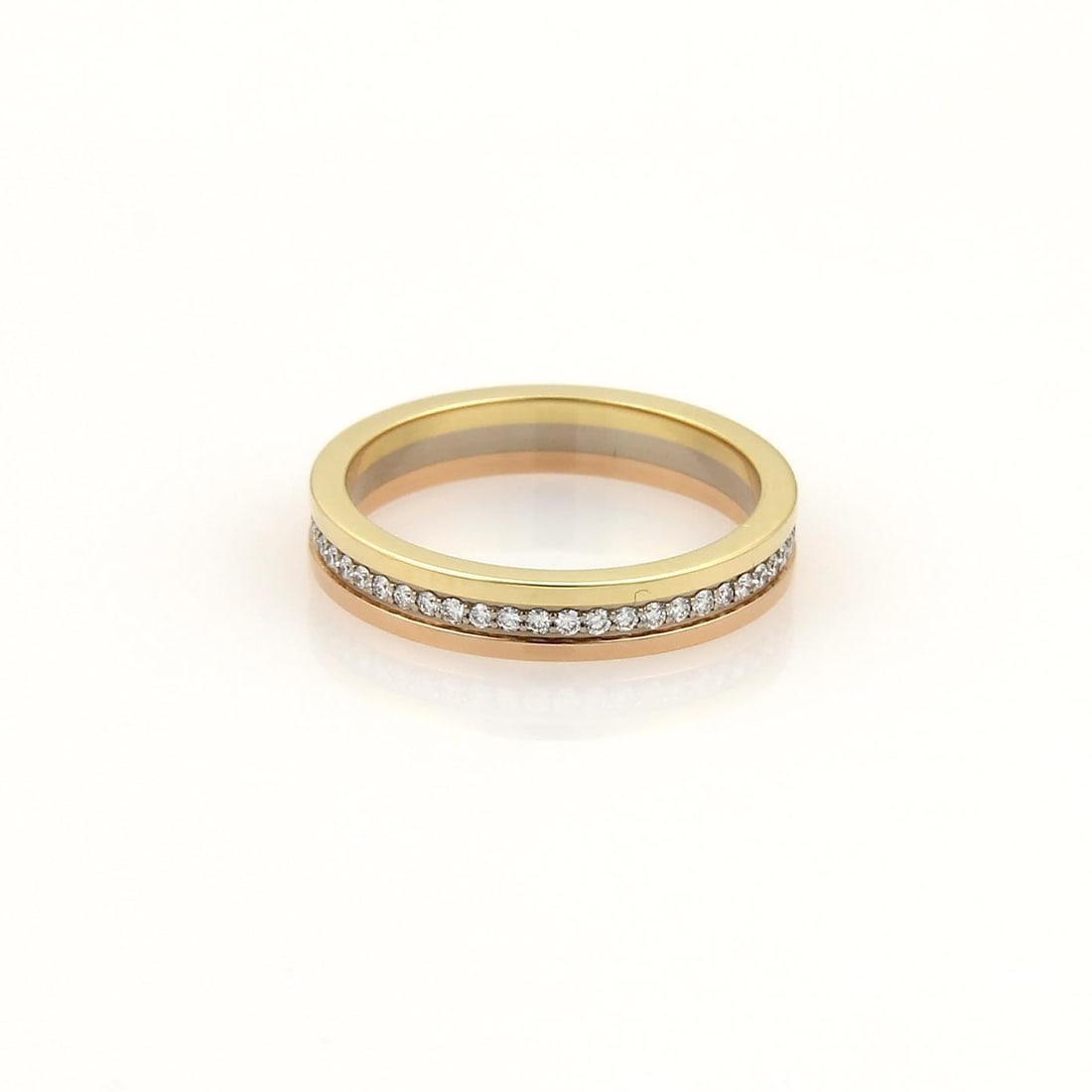 Cartier Diamond 18k Tricolor Gold Stack Band Ring Size 46 US 3.75 Cert: Cartier Diamond 18k Tricolor Gold Stack Band Ring Size 46 US 3.75 Cert Discover the elegance of this authentic Cartier ring, expertly crafted from 18k yellow, rose, and white gold with a high
