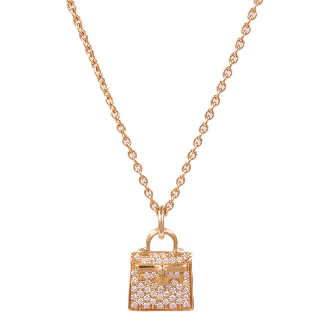 HERMES Amulettes Kelly Diamond Necklace in 18K Rose Gold: HERMES Amulettes Kelly Diamond Necklace in 18K Rose Gold Introducing the exquisite HERMES Amulettes Kelly pendant necklace, a stunning piece crafted from 18K pink gold (K18PG) and adorned with a spark