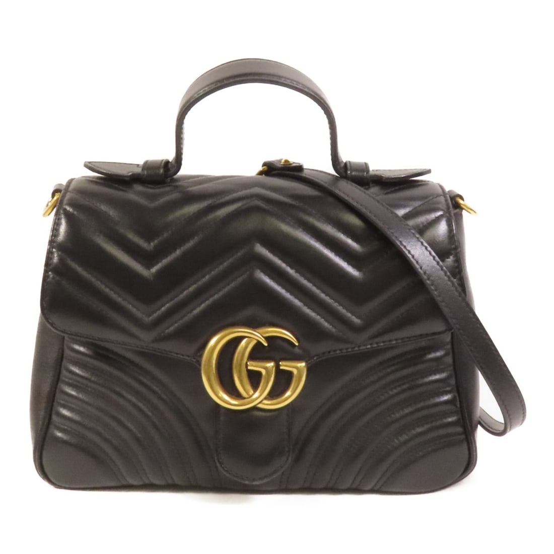 Black Calfskin Gucci GG Marmont Small 2way Shoulder Bag with Gold Hardware: Black Calfskin Gucci GG Marmont Small 2way Shoulder Bag with Gold Hardware This is a GUCCI GG Marmont small 2-way shoulder bag crafted from black calfskin leather. Designed for versatility, it feature