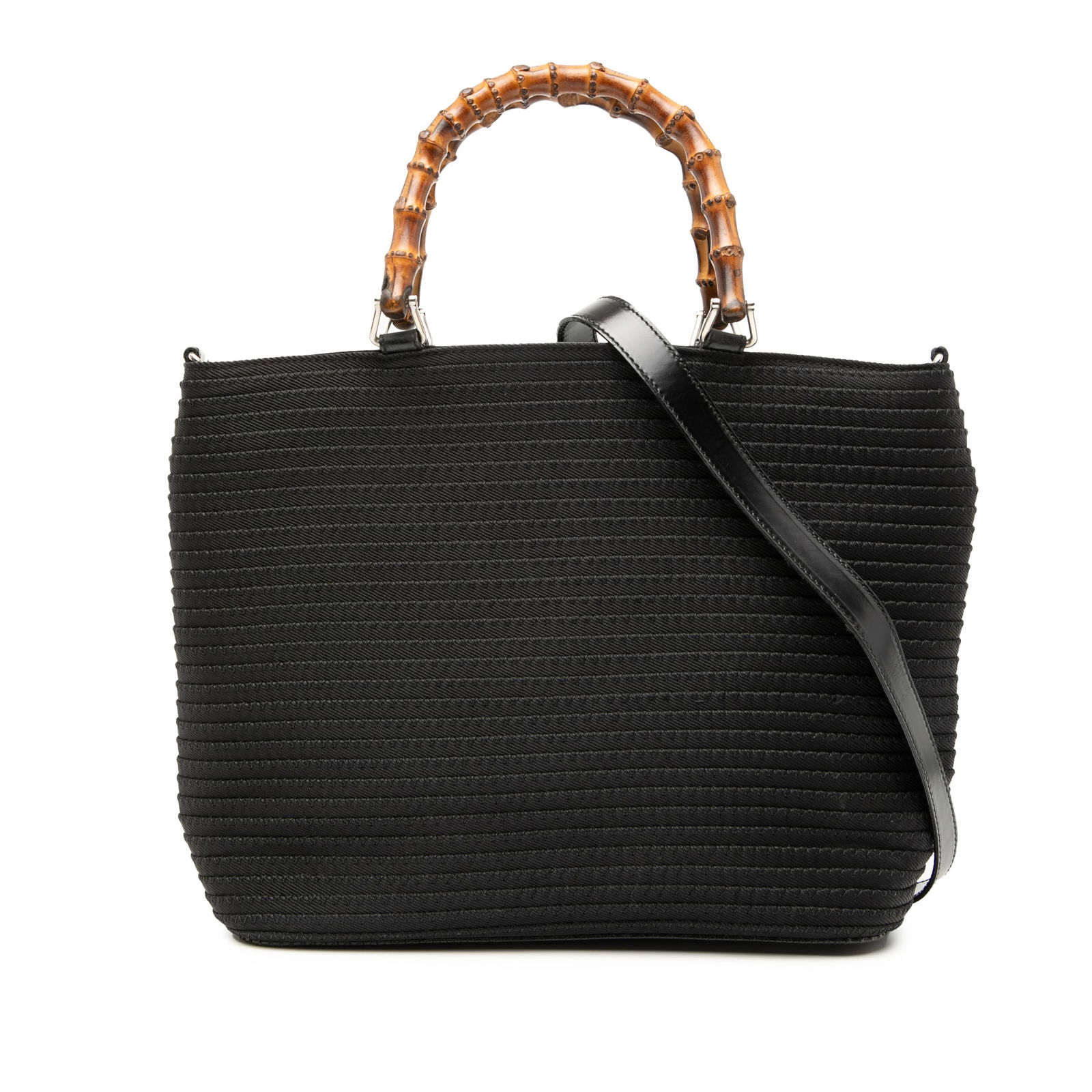 Black Nylon Satchel with Bamboo Handles and Leather Strap by Gucci: Black Nylon Satchel with Bamboo Handles and Leather Strap by Gucci This Gucci Nylon Bamboo Satchel showcases a black fabric body with distinctive bamboo top handles and a detachable flat leather strap