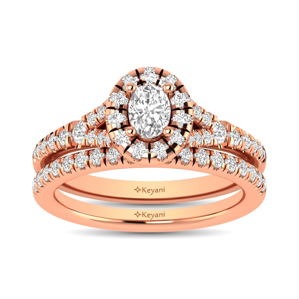Diamond Split Shank Single Halo Bridal Ring 1 Ct.tw Oval Cut in 14K Rose Gold: Diamond Split Shank Single Halo Bridal Ring 1 Ct.tw Oval Cut in 14K Rose Gold This Split Shank Single Halo Bridal Ring set with Oval Cut diamond 1/3 Ct.Tw. center. Total diamond weight 1 Ct.Tw. 14k Ro