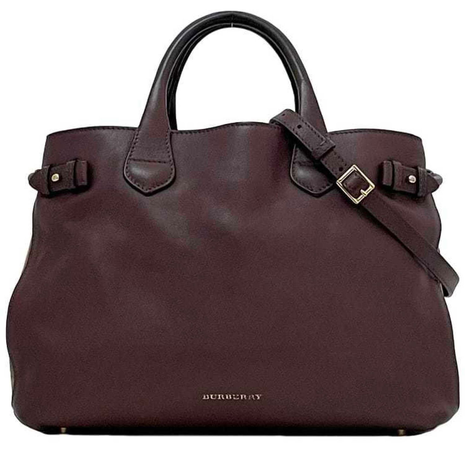 Burgundy Canvas and Leather Banner Tote by Burberry: Burgundy Canvas and Leather Banner Tote by Burberry This is a Burberry The Banner handbag crafted in a combination of canvas and leather, presented in a rich burgundy color. The bag is designed for wo