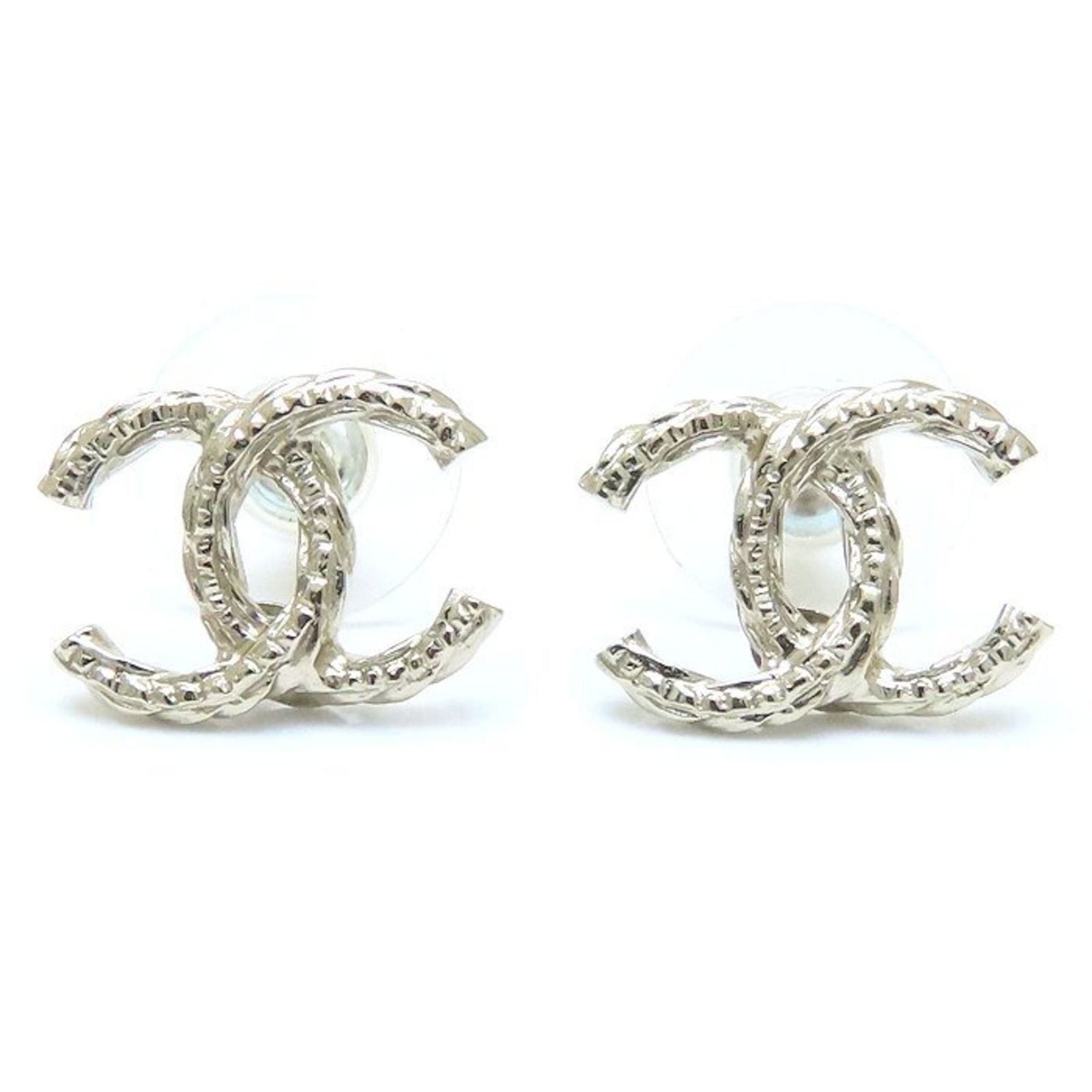 Gold Plated Coco Mark Pin by Chanel: Gold Plated Coco Mark Pin by Chanel This Chanel Coco Mark accessory features a gold plated finish and showcases the iconic Coco Mark design. Crafted for women, it is made in France and displays a gold