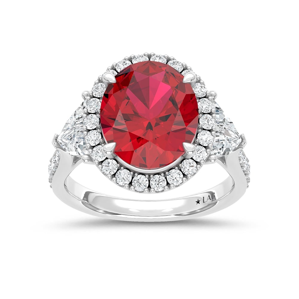 14K White Gold Lab Grown Diamond 8 1/2 Ct.Tw. Oval Shape Recrystalized Ruby Engagement Ring (Center: 14K White Gold Lab Grown Diamond 8 1/2 Ct.Tw. Oval Shape Recrystalized Ruby Engagement Ring (Center 6 5/8 ct) Make a bold statement of elegance with this 14K white gold engagement ring. The centerpiec