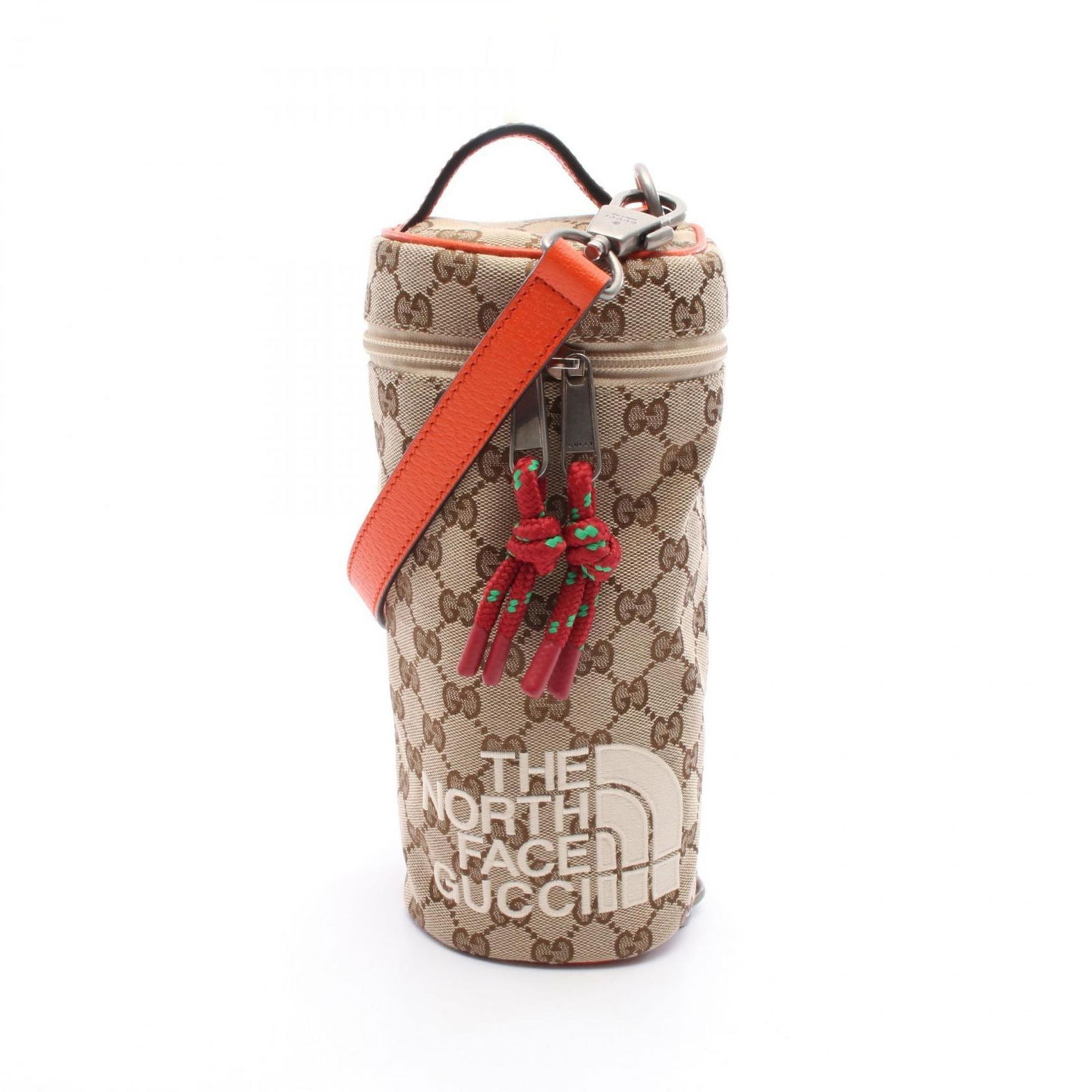 Beige Brown Canvas Leather Bag Gucci The North Face x Collaboration: Beige Brown Canvas Leather Bag Gucci The North Face x Collaboration This Gucci The North Face x bag is crafted from beige and brown canvas with leather accents. Designed for men, it features a compact