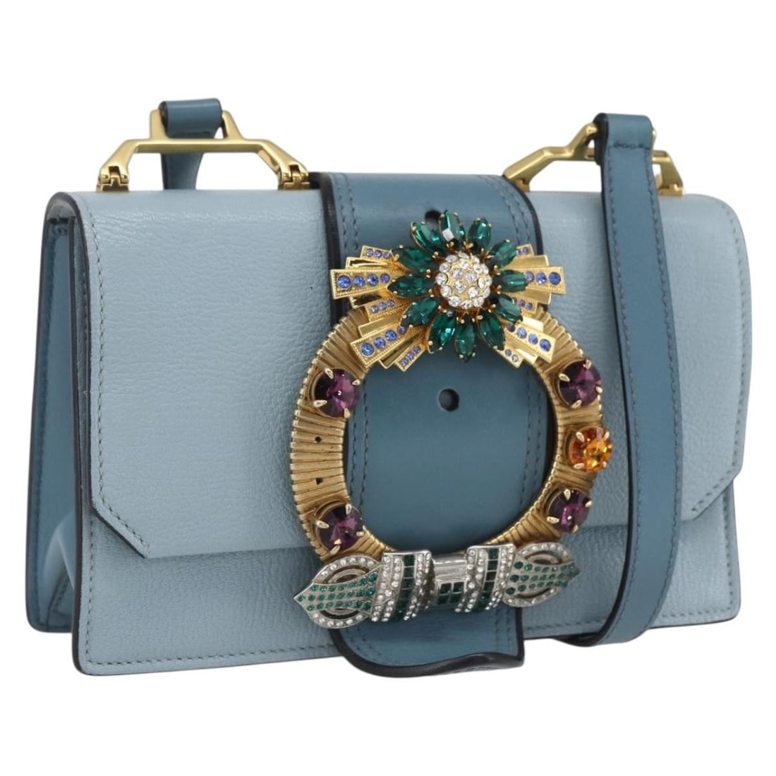 Light Blue Leather Shoulder Bag by Miu Miu with Gold Accents: Light Blue Leather Shoulder Bag by Miu Miu with Gold Accents This Miu Miu shoulder bag is crafted from leather in light blue with gold-tone accents. It features an adjustable shoulder strap and includ