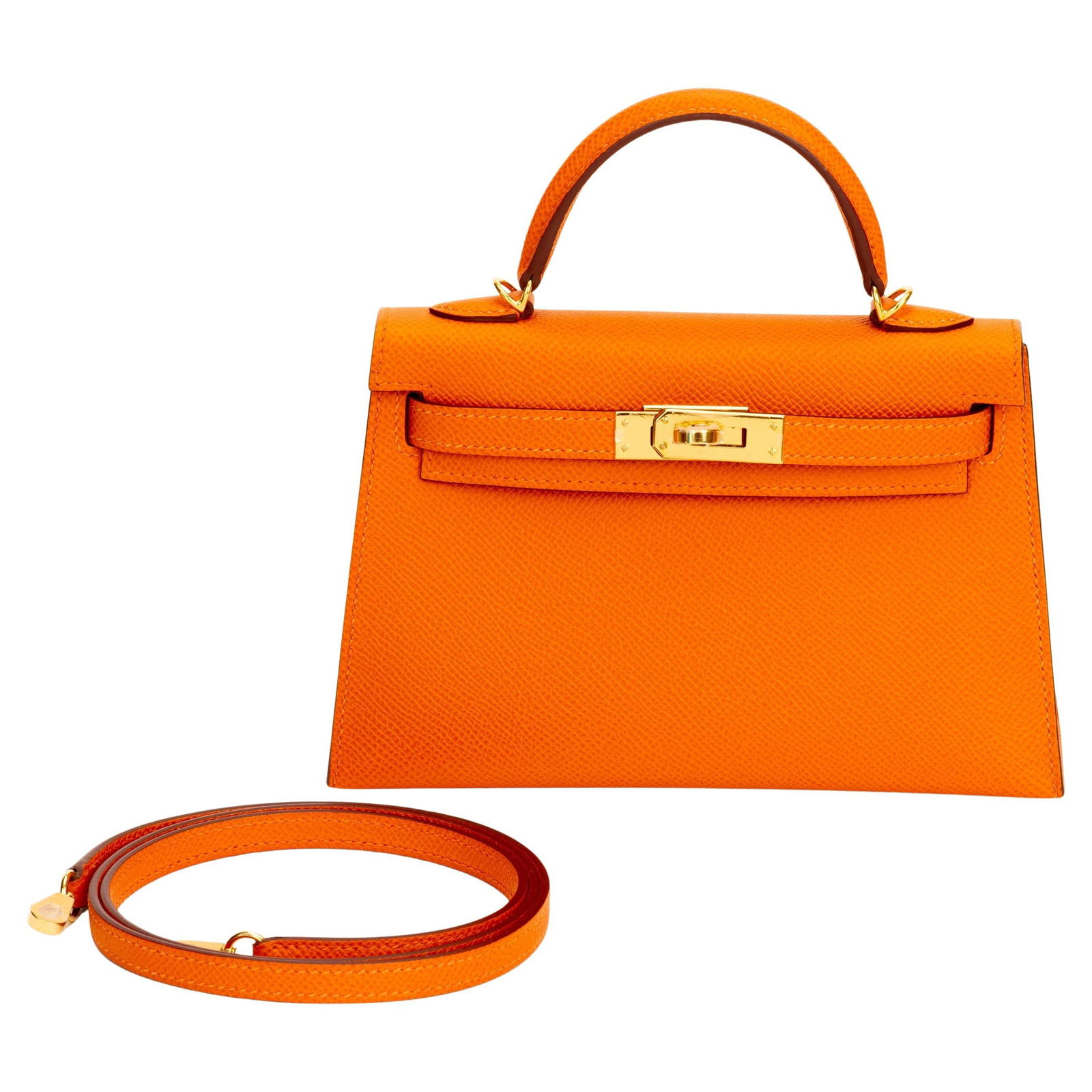 Hermes Mini Kelly Sellier 20 Orange Epsom Authentic with Box: Hermes Mini Kelly Sellier 20 Orange Epsom Authentic with Box This exquisite Hermes Mini Kelly Sellier bag is a must-have for collectors and fashion enthusiasts alike. Crafted from premium orange Epsom