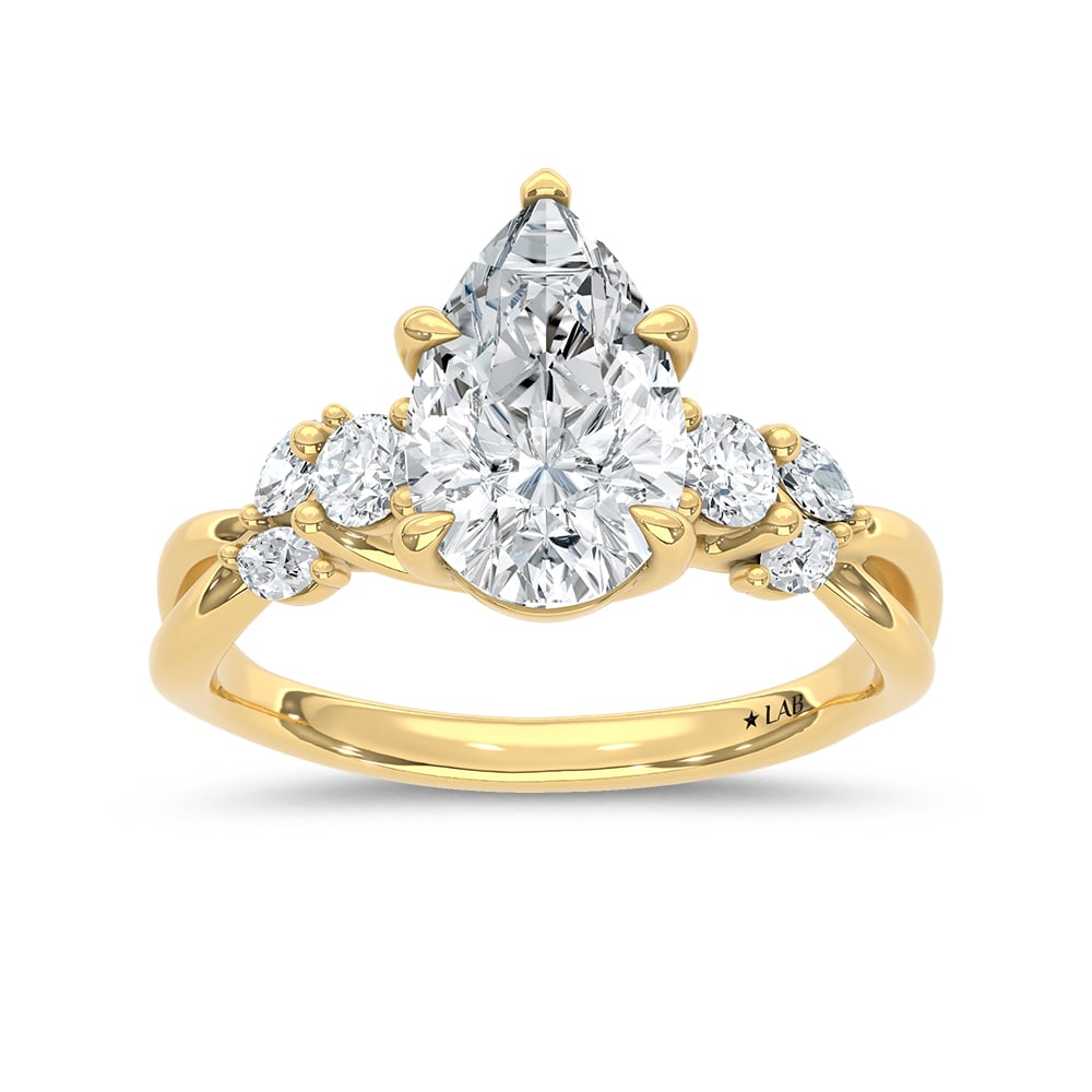 14K Yellow Gold 2 1/3 Ct.Tw. Lab Grown Diamond Pear Shape Engagement Ring (IGI Certified Center 2ct: 14K Yellow Gold 2 1/3 Ct.Tw. Lab Grown Diamond Pear Shape Engagement Ring (IGI Certified Center 2ct Pear) Celebrate your love with this elegant 14K Yellow gold engagement ring, featuring a 2-carat IGI