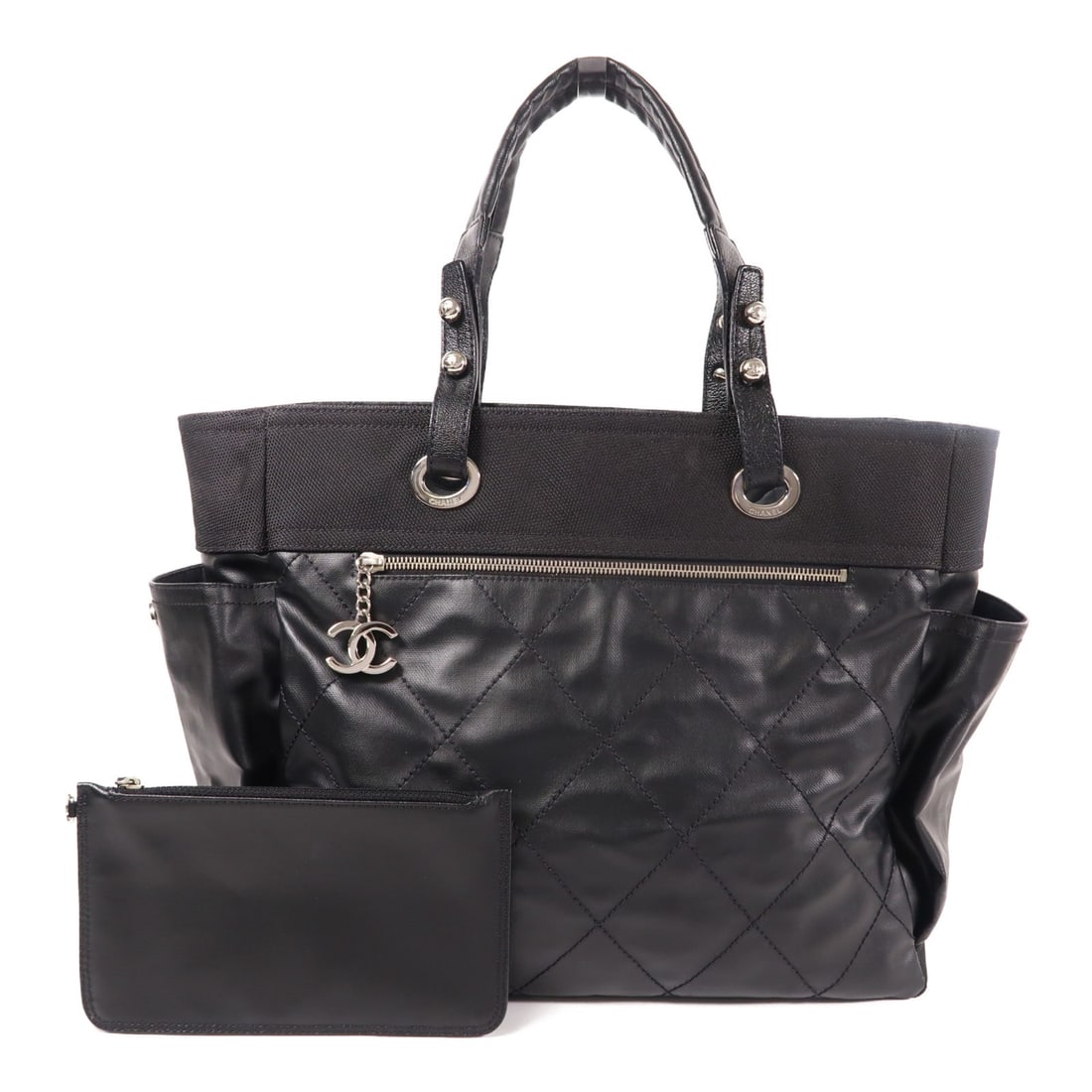 CHANEL Black PVC Coated Canvas Tote Bag with SHW: CHANEL Black PVC Coated Canvas Tote Bag with SHW This stylish CHANEL tote bag showcases a sophisticated design, crafted from durable PVC coated canvas in an elegant black hue. The generous dimensions