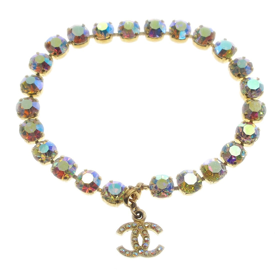 Chanel Gold Rhinestone Charm Anklet 95P: Chanel Gold Rhinestone Charm Anklet 95P Add a touch of elegance to your collection with this exquisite Chanel Anklet. Featuring a charming design adorned with shimmering rhinestones, this anklet is pe