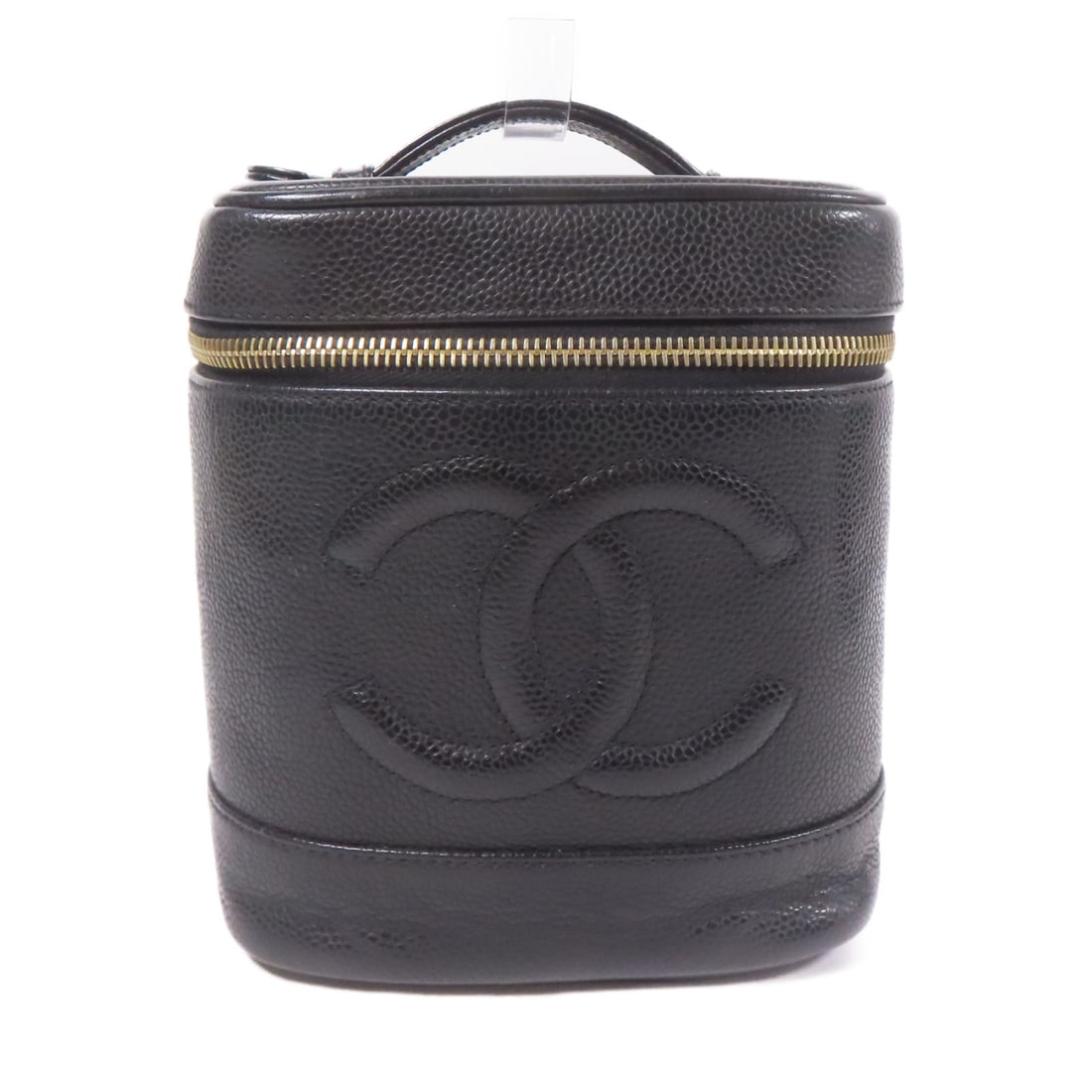 CHANEL Vintage Black Calfskin Vanity Handbag with GHW: CHANEL Vintage Black Calfskin Vanity Handbag with GHW Elevate your accessory collection with this vintage Chanel CC handbag. Crafted from high-quality black calfskin leather, this handbag embodies tim