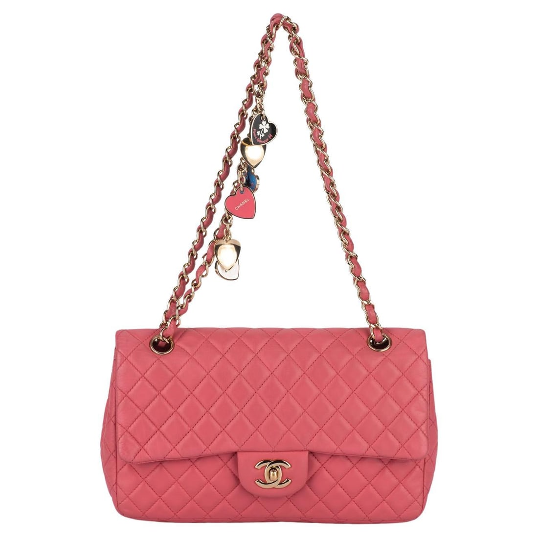 Chanel Camellia Charm Pink Lambskin Bag with Gold Chain: Chanel Camellia Charm Pink Lambskin Bag with Gold Chain Introducing the Chanel Camellia Charm Single Flap Bag, a luxurious accessory crafted from soft pink lambskin. This elegant shoulder bag features