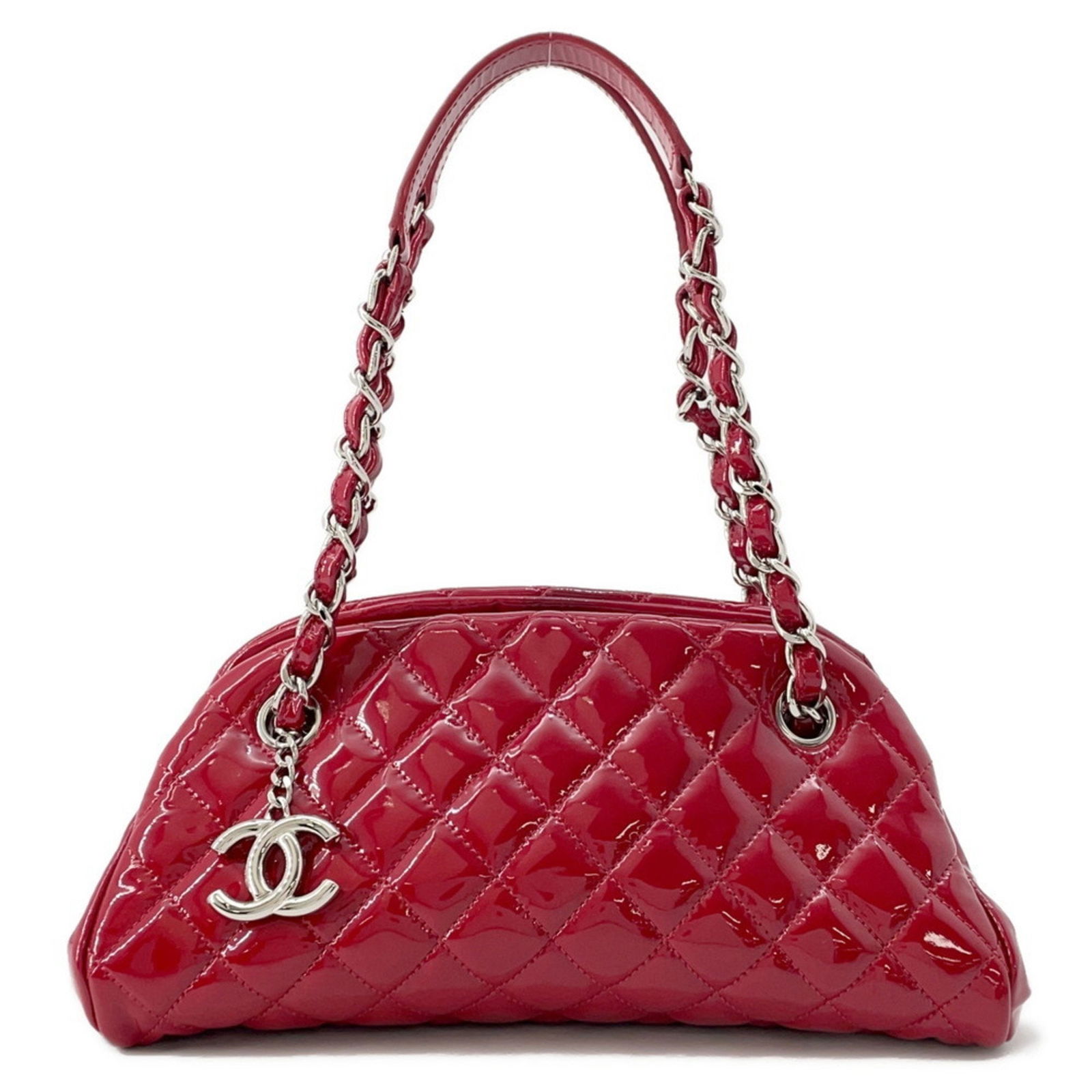 Red Patent Leather Chanel Mademoiselle Handbag 13cm x 27cm x 11.5cm: Red Patent Leather Chanel Mademoiselle Handbag 13cm x 27cm x 11.5cm This Chanel Mademoiselle bag features a red patent leather exterior, designed for women. It offers a spacious interior and showcases