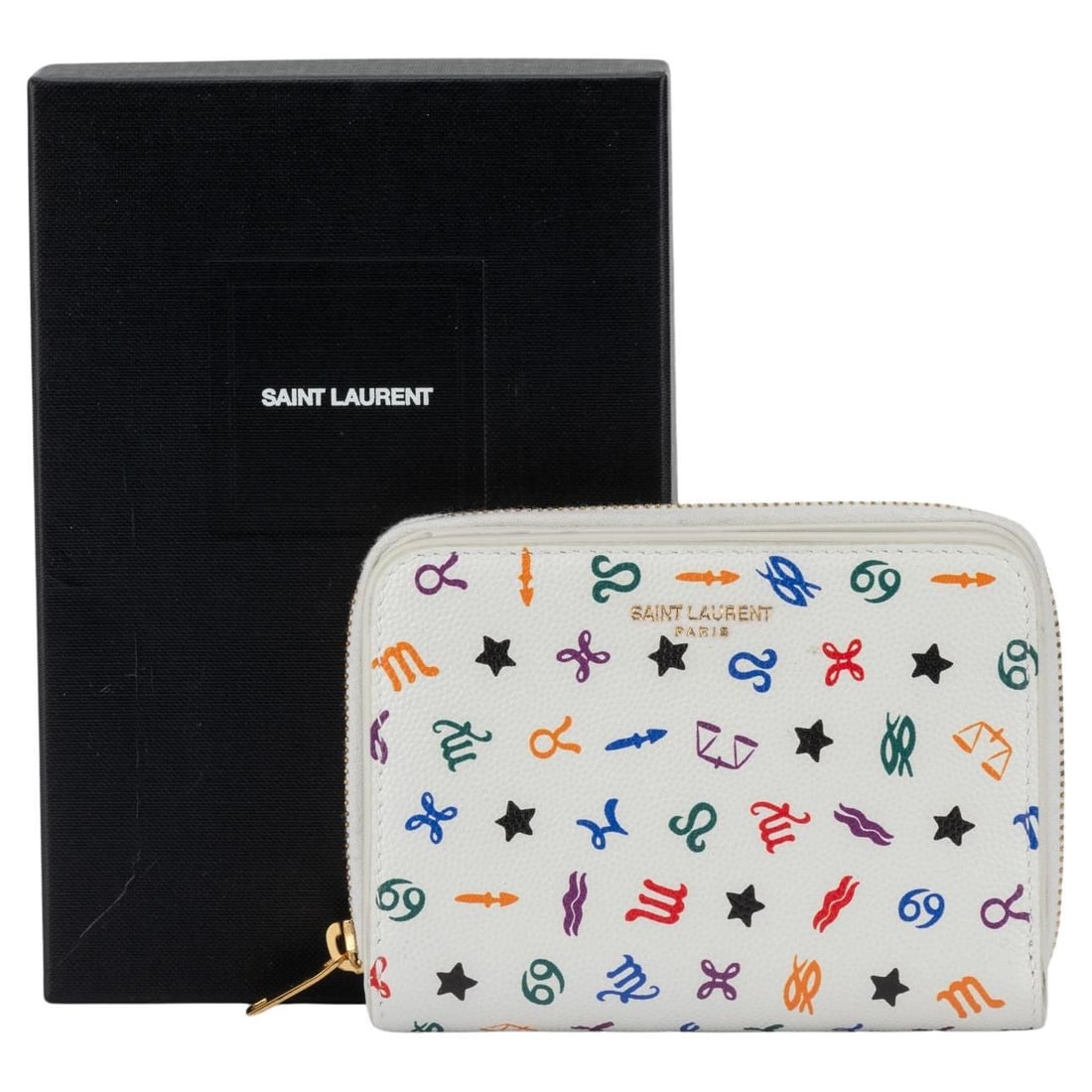 Yves Saint Laurent White Leather Astrology Bifold Wallet with Box: Yves Saint Laurent White Leather Astrology Bifold Wallet with Box Introducing the Yves Saint Laurent New White Leather Astrology Wallet, a stunning accessory for those who appreciate both style and fu