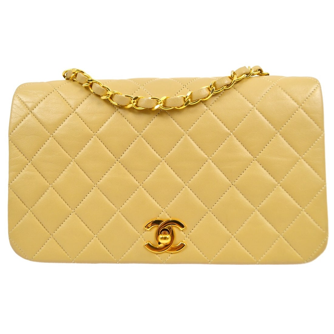 Chanel Beige Lambskin Matelasse Turnlock Small Shoulder Bag: Chanel Beige Lambskin Matelasse Turnlock Small Shoulder Bag This Chanel Beige Lambskin Turnlock Small Full Flap Shoulder Bag is a timeless accessory that combines elegance and practicality. The bag fe