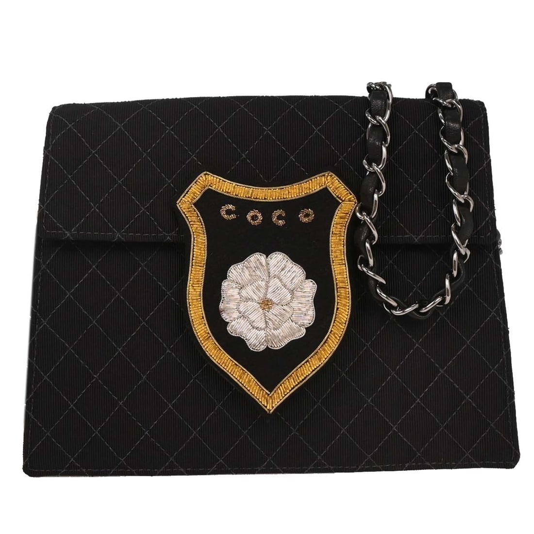 Chanel Black Canvas Quilted Emblem Shoulder Bag: Chanel Black Canvas Quilted Emblem Shoulder Bag This Chanel Black Canvas Emblem Shoulder Bag is a stylish and versatile accessory suitable for casual occasions. The bag features a sleek matelasse patt