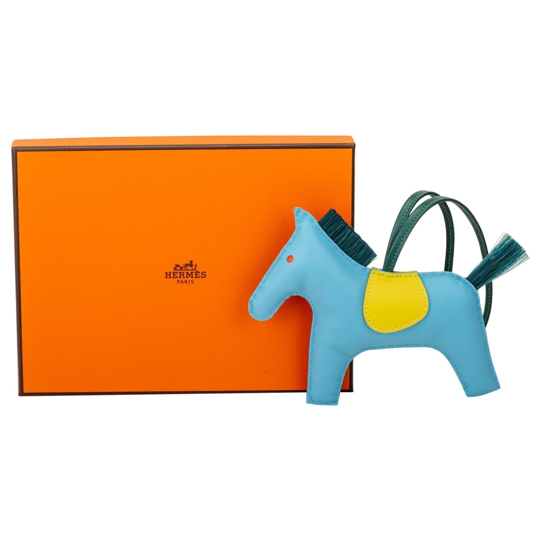 Hermes Grigri GM Rodeo Charm Limited Edition Turquoise: Hermes Grigri GM Rodeo Charm Limited Edition Turquoise Introducing the exquisite Hermes Grigri GM Rodeo Charm in a stunning turquoise hue. This limited edition charm embodies luxury and artistry, feat