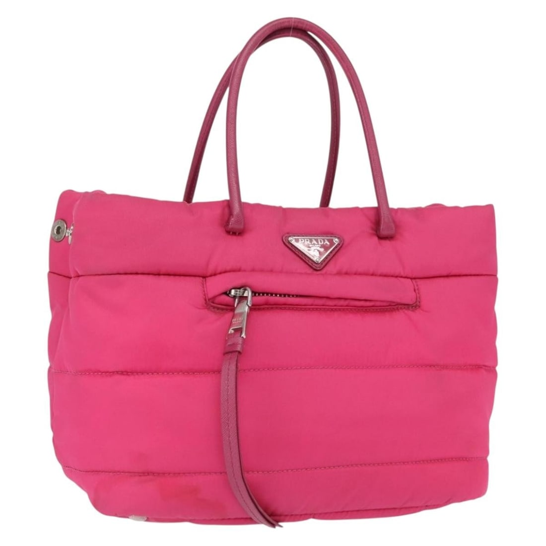 Pink Nylon Prada Handbag with Silver Accents and Dust Bag: Pink Nylon Prada Handbag with Silver Accents and Dust Bag This Prada handbag features a pink nylon exterior with silver-tone accents and is designed for hand carry. The bag is made in Italy and comes