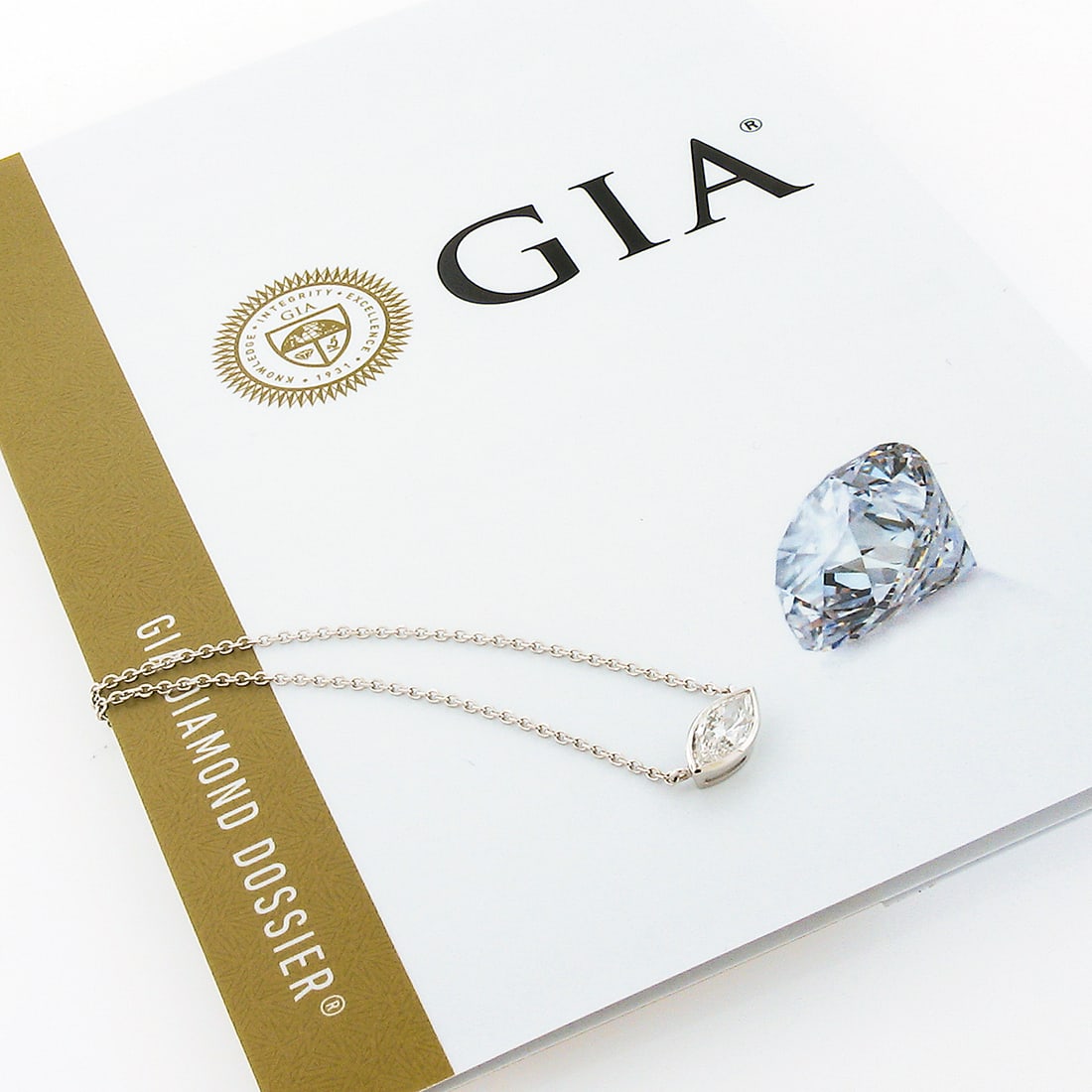 GIA Certified 14K White Gold 0.66ct Marquise Diamond Pendant Necklace: GIA Certified 14K White Gold 0.66ct Marquise Diamond Pendant Necklace This exquisite pendant necklace is crafted from solid 14K white gold and features a stunning GIA certified marquise brilliant cut