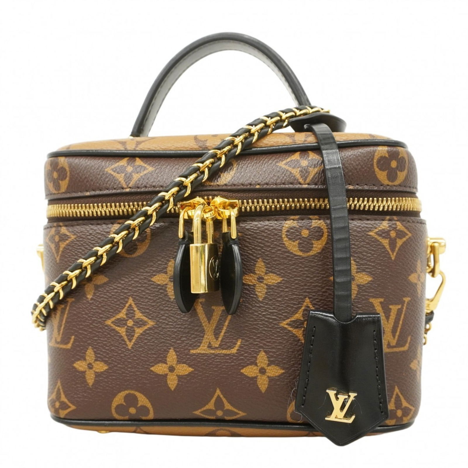 Louis Vuitton Vanity Brown Canvas Handbag from Italy: Louis Vuitton Vanity Brown Canvas Handbag from Italy This Louis Vuitton Vanity bag features a brown canvas exterior and is designed for women. Made in Italy, it offers a compact and structured silhoue