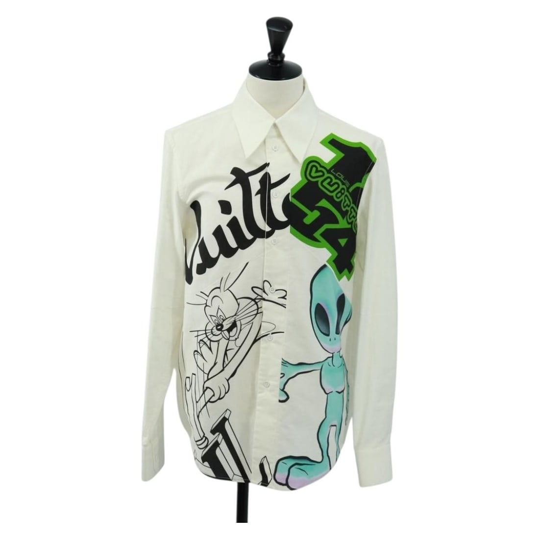 White Louis Vuitton Cotton Printed Button-Up Shirt from Italy: White Louis Vuitton Cotton Printed Button-Up Shirt from Italy This Louis Vuitton printed shirt features a classic design crafted from 100% cotton in white. Made in Italy, the shirt offers a comfortabl