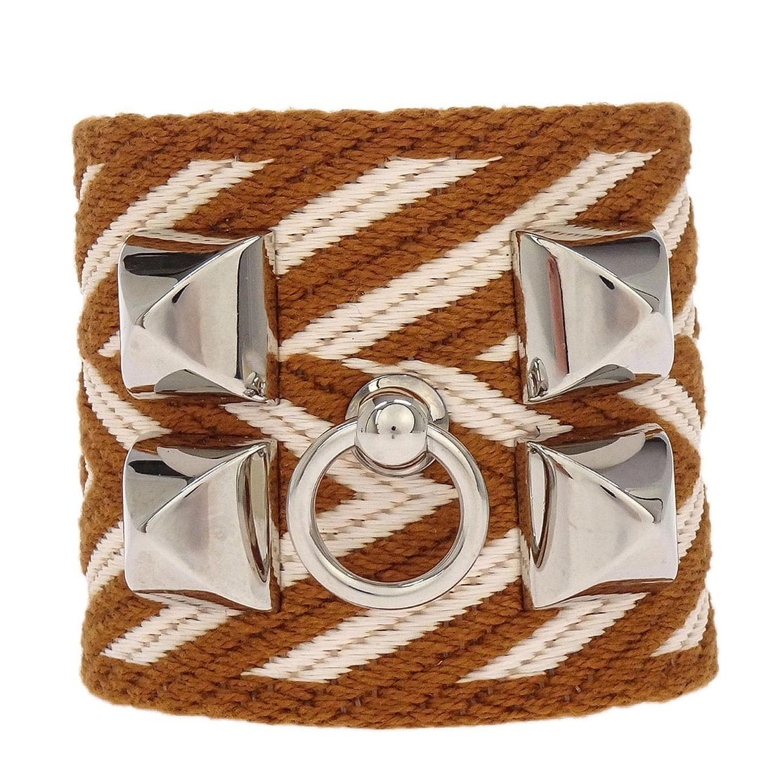 Brown Leather Collier De Chien ZigZag Bangle Bracelet T2 by Hermes: Brown Leather Collier De Chien ZigZag Bangle Bracelet T2 by Hermes This Hermes Collier De Chien ZigZag Manchette bangle features a brown leather construction in a bold cuff style. The bracelet is of v