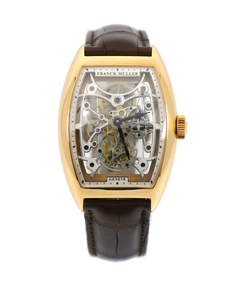 Franck Muller Curvex Tourbillon 18K Rose Gold Watch with Box and Papers: Franck Muller Curvex Tourbillon 18K Rose Gold Watch with Box and Papers Discover the elegance of the Franck Muller Curvex Tourbillon, a stunning wristwatch crafted from 18K rose gold. This mechanical