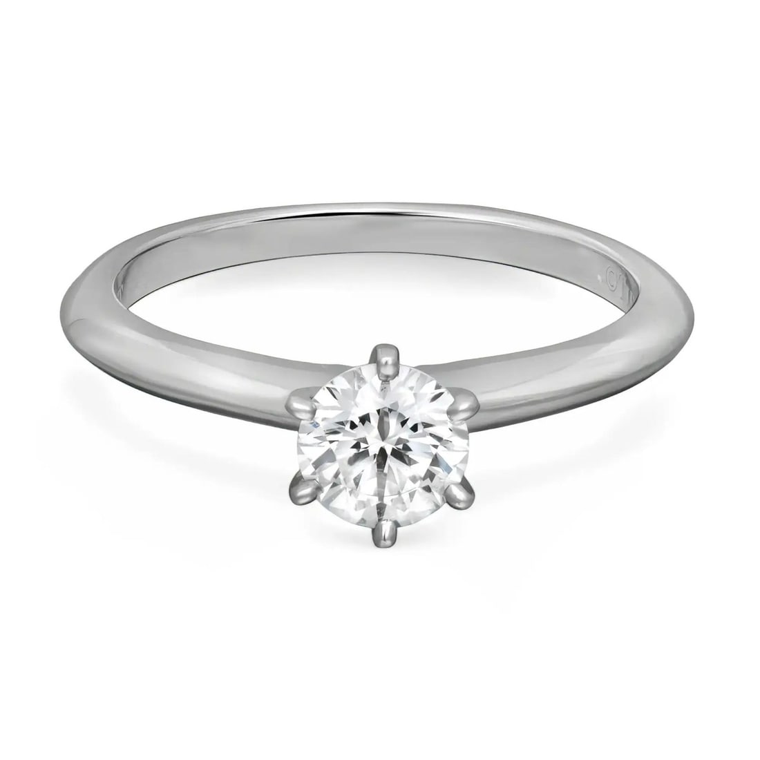 Tiffany & Co. Platinum Round Cut Diamond Engagement Ring 0.49ctw: Tiffany & Co. Platinum Round Cut Diamond Engagement Ring 0.49ctw This exquisite Tiffany & Co. round cut diamond solitaire engagement ring is beautifully crafted in platinum. It features a stunning cen