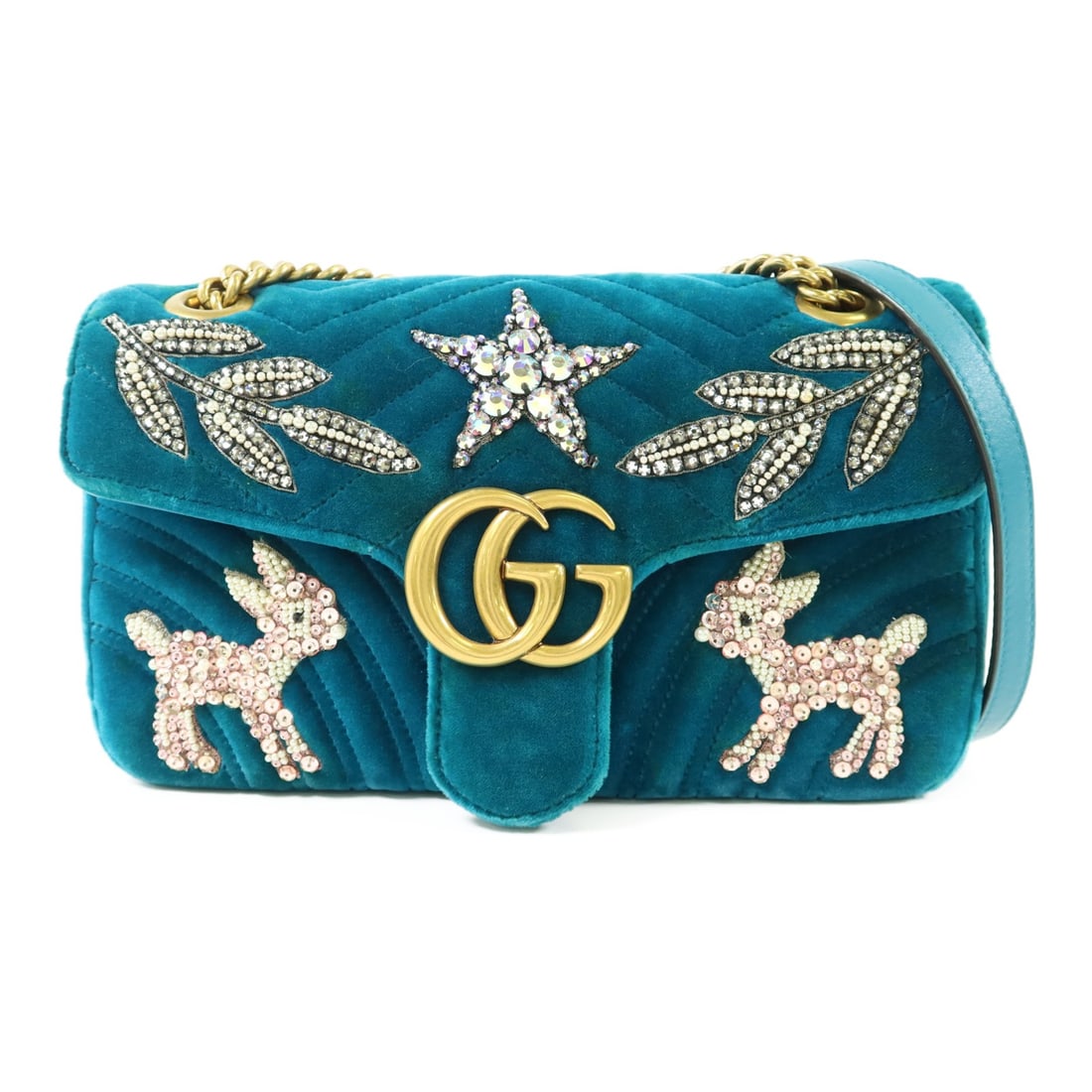 Velvet Green GG Marmont Shoulder Bag by Gucci with Gold Tone Hardware: Velvet Green GG Marmont Shoulder Bag by Gucci with Gold Tone Hardware This is a Gucci GG Marmont shoulder bag crafted with green velvet and featuring gold tone hardware. The bag is made in Italy and h