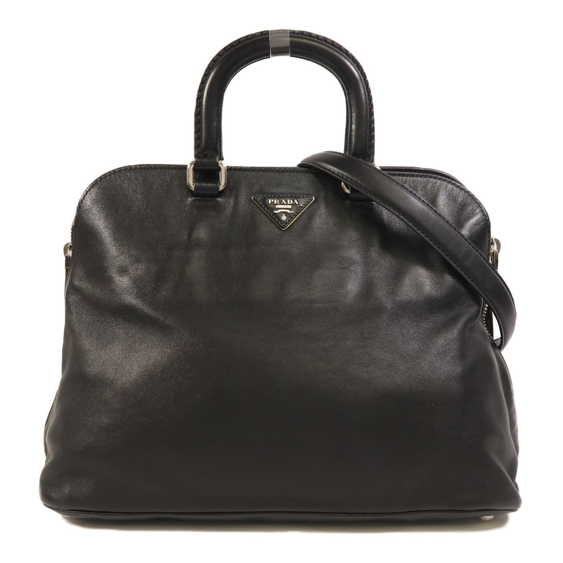Black Calfskin Leather Prada 2-Way Shoulder Bag with Silver Hardware: Black Calfskin Leather Prada 2-Way Shoulder Bag with Silver Hardware This Prada 2-way shoulder bag is crafted from black calfskin leather, offering versatility and sophistication. Made in Italy, it fe