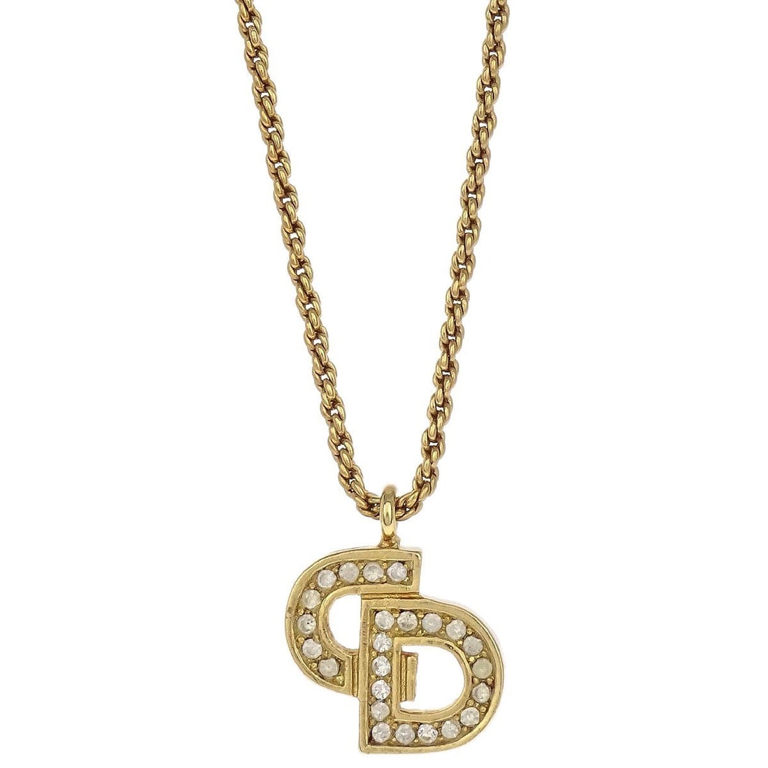 Gold Tone Pendant Necklace by Christian Dior with Rhinestone Charm: Gold Tone Pendant Necklace by Christian Dior with Rhinestone Charm This vintage Christian Dior necklace features a gold-tone pendant adorned with rhinestones. The pendant is designed in a charm style