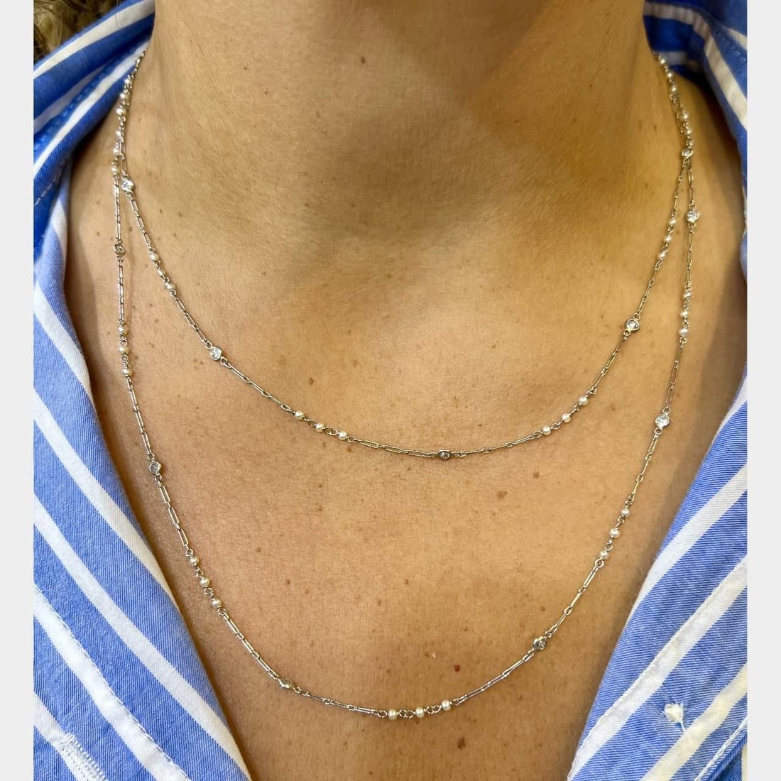 Platinum Natural Pearl Diamond Necklace 39 Inches 1.10 Ct: Platinum Natural Pearl Diamond Necklace 39 Inches 1.10 Ct This exquisite Platinum Natural Pearl & Diamond by the Yard Necklace features a stunning combination of natural pearls and 18 European-cut dia