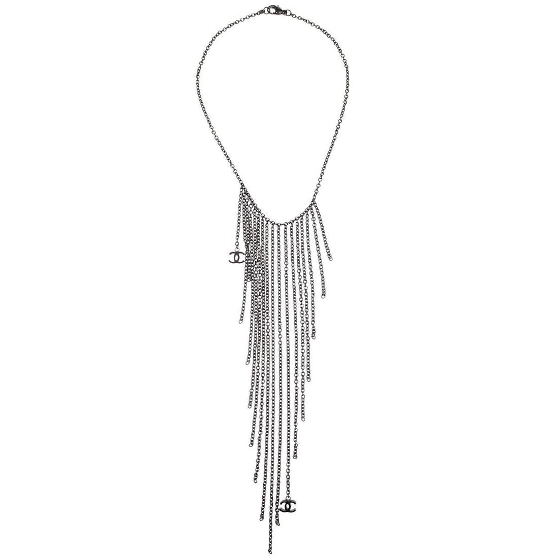 Chanel 02A Silver Plated Fringe Chain Necklace: Chanel 02A Silver Plated Fringe Chain Necklace This exquisite Chanel Fringe Chain Necklace features a stunning silver tone that adds a touch of elegance to any outfit. The necklace showcases a sophist