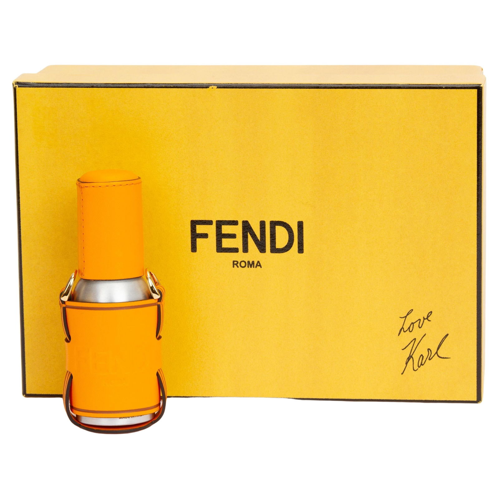 Fendi Clementine Spray Dispenser in Mandarin Orange Leather with Gold Hardware: Fendi Clementine Spray Dispenser in Mandarin Orange Leather with Gold Hardware Introducing the Fendi Clementine Spray Dispenser, a stylish and functional accessory crafted from luxurious mandarin oran