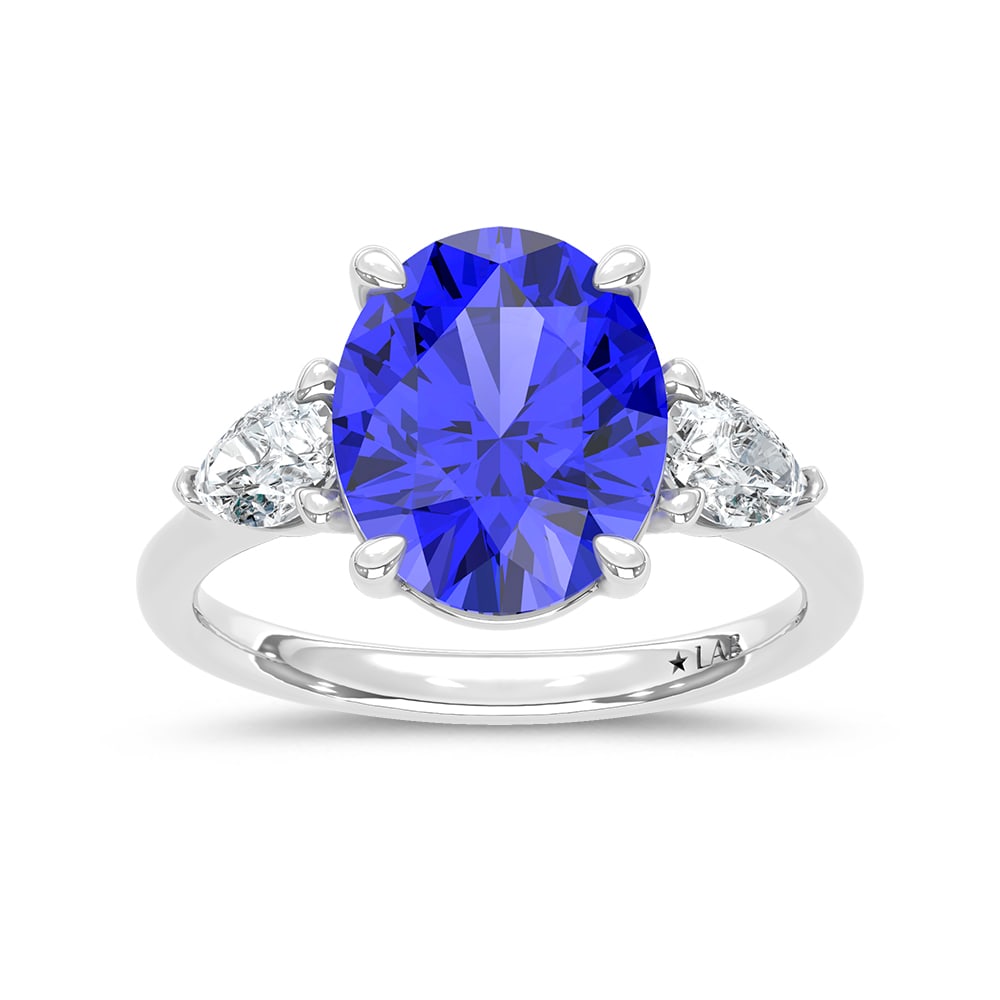 14K White Gold Lab Grown Diamond 5 5/8 Ct.Tw. Cushion Shape Recrystalized Blue Sapphire Engagement: 14K White Gold Lab Grown Diamond 5 5/8 Ct.Tw. Cushion Shape Recrystalized Blue Sapphire Engagement Ring (Center 5 ct) Elevate your elegance with this 14K white gold engagement ring, showcasing a stunn
