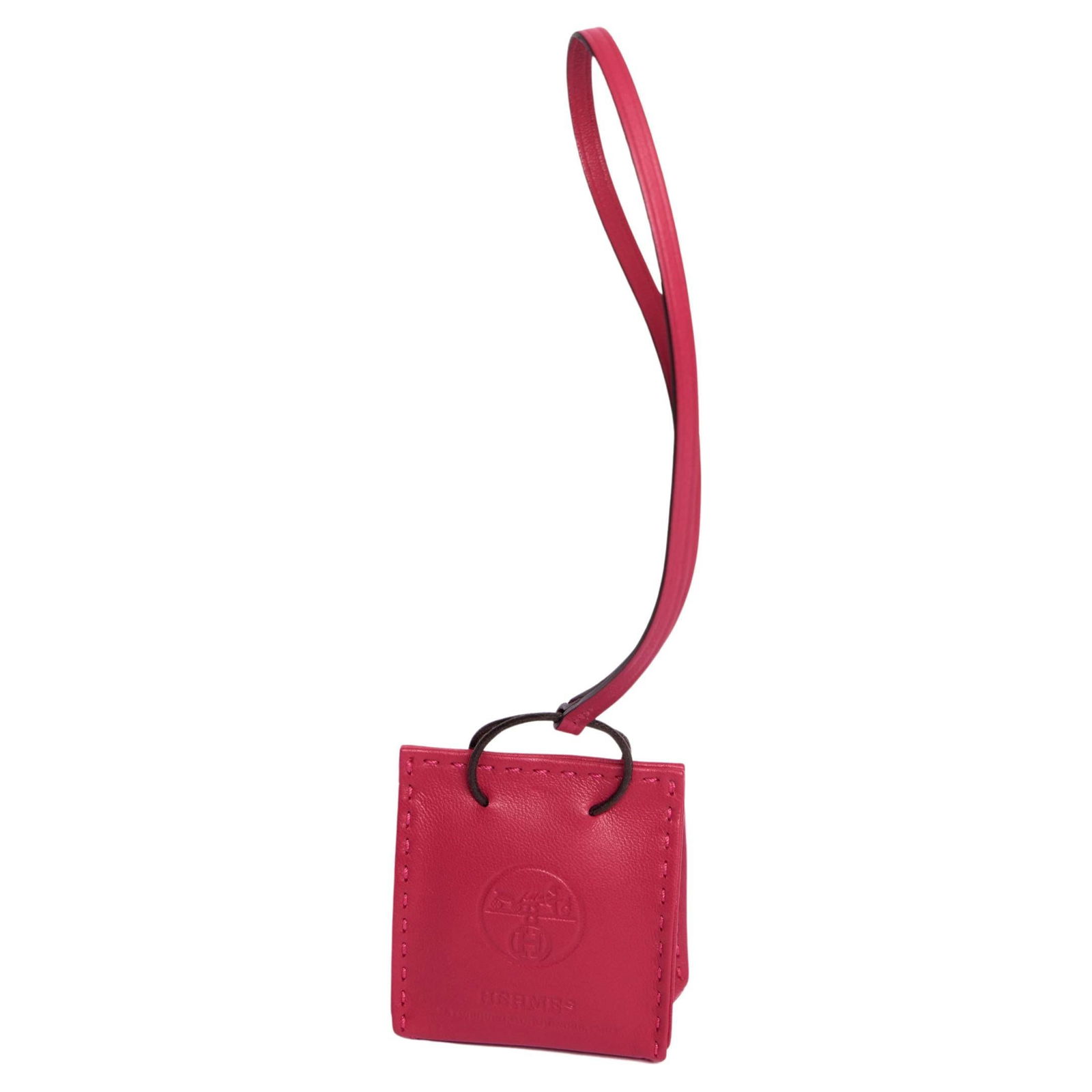 Hermes Rose Orange Bag Charm Milo Lambskin 21st Century: Hermes Rose Orange Bag Charm Milo Lambskin 21st Century This exquisite Hermes Rose "Orange Bag Charm" is crafted from luxurious Milo lambskin and swift calfskin, featuring a distinctive "ex-libris" ho