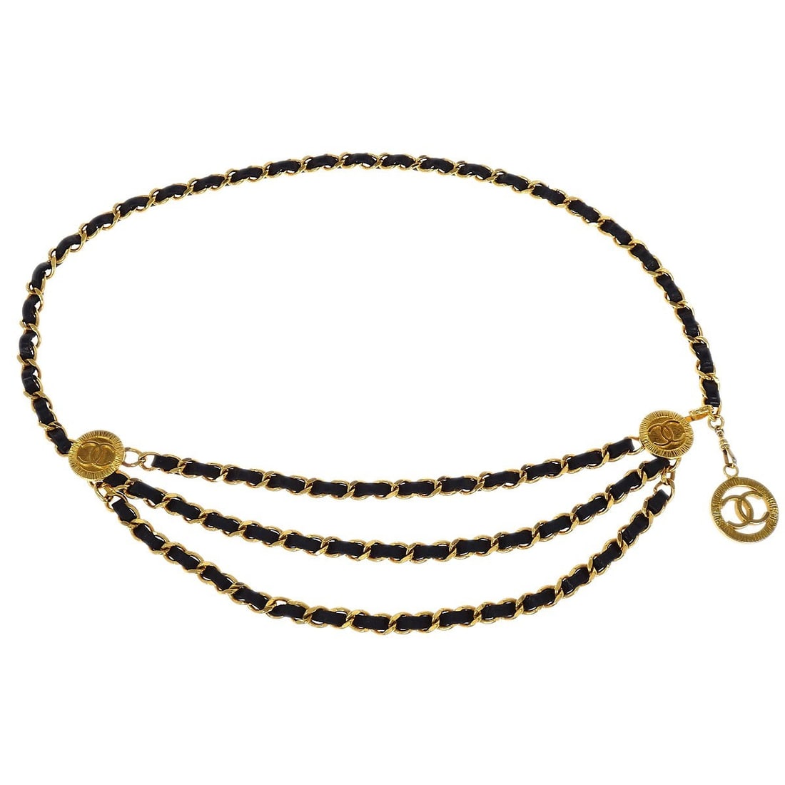 Gold Tone Medallion Chain Belt by Chanel Small Size 1982: Gold Tone Medallion Chain Belt by Chanel Small Size 1982 This Chanel chain belt features gold and black medallion accents and is designed in a small size. Crafted in France, it is a statement accessor