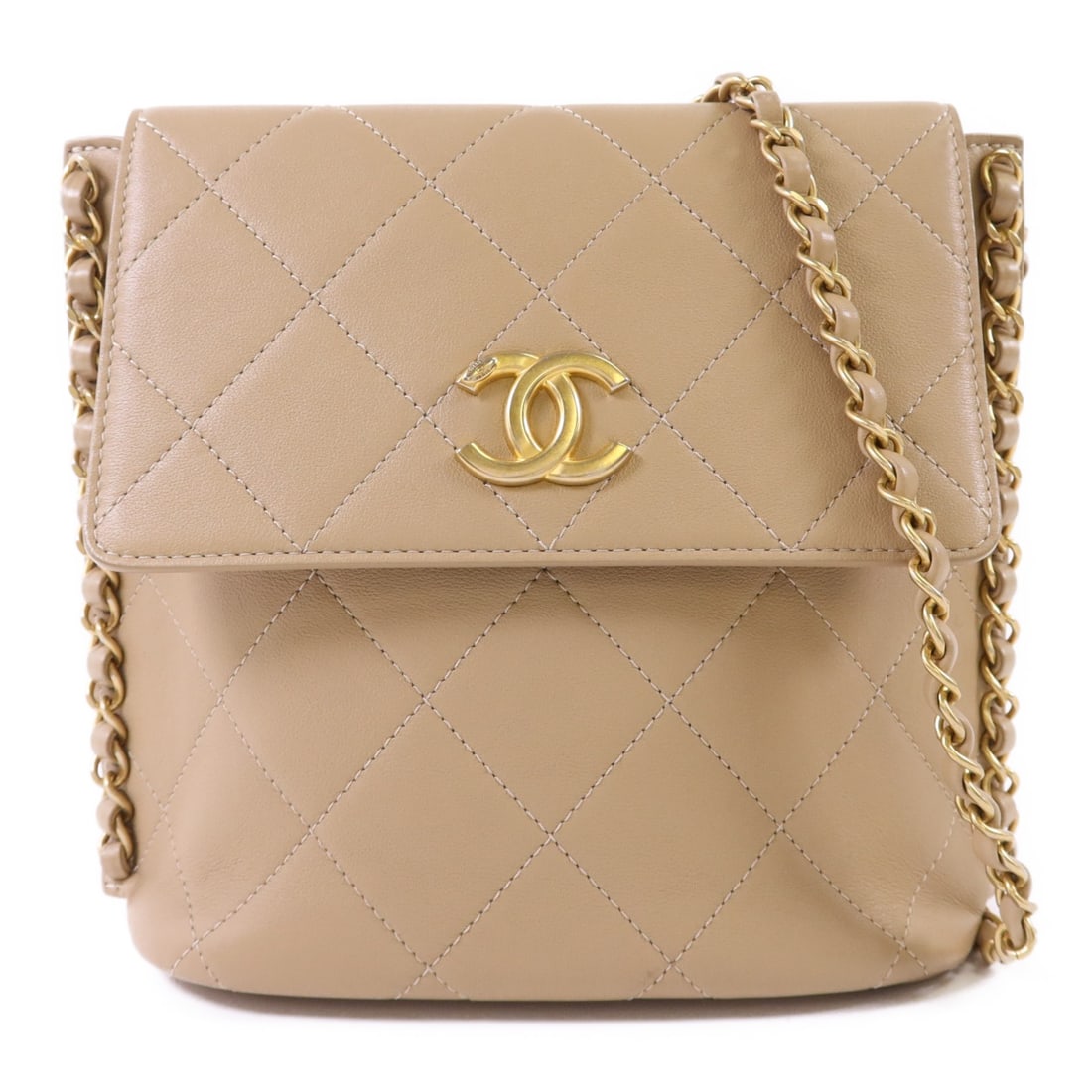 Beige Calfskin Leather Shoulder Bag with Gold Tone CC Logo by CHANEL: Beige Calfskin Leather Shoulder Bag with Gold Tone CC Logo by CHANEL This CHANEL shoulder bag features a beige calfskin leather exterior with a signature CC logo and gold-tone chain detailing. Crafted