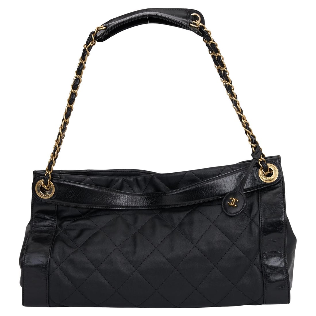 Chanel Black Calfskin Tote Bag with Diamond Quilting: Chanel Black Calfskin Tote Bag with Diamond Quilting Elevate your style with this Chanel Black Calfskin Shopper Tote, a classic piece that embodies timeless elegance. Crafted from luxurious black calf