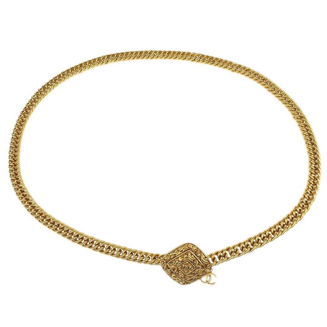 Chanel Vintage Gold-Plated Chain Belt with Charm Pendant: Chanel Vintage Gold-Plated Chain Belt with Charm Pendant This stunning Chanel chain belt features a luxurious gold-plated finish, perfect for adding a touch of elegance to any outfit. The charm pendan